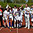 Ein Team in weißen Trikots jubelt.