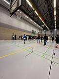 Spieler in einer Halle.