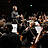 Ein Teil des Orchesters und der Dirigent.