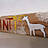 Holz mit Inschrift und Alpaka