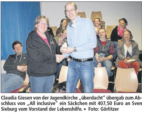 Bild mit Spendenübergabe