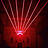 Von einem Gebäude scheinen rote Laserstrahlen.