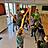 Bild zwölf zeigt eine Gruppe Kinder und Erwachsene