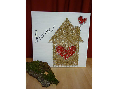 Eine Karte mit dem Schriftzug home.