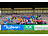 Rund 100 Fußballspielerinnen und -spieler verschiedener Teams stehen jubelnd mit erhobenen Armen auf der Tribüne eines Stadions. Im Vordergrund sind Werbebanden mit den Logos von Küberit und AOK zu sehen.