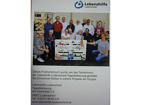 Eine Titelseite eines Postkartenbuches.