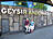 Zwei Menschen stehen vor einer Wand mit der Aufschrift „GEYSIR ANDERNACH“